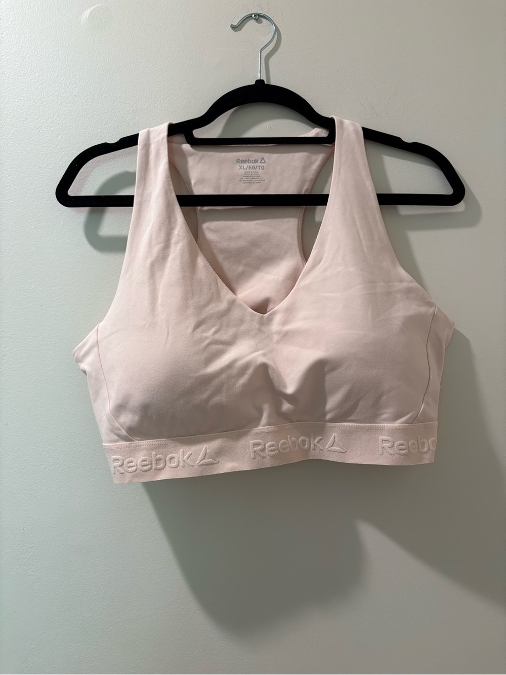 Reebok Women's Pale Pink V‑Neck Seamless Sports Bra